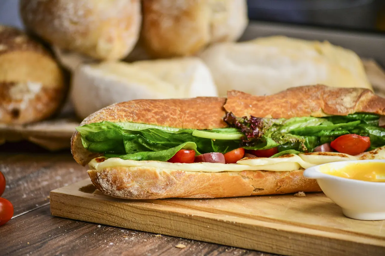 Home-made bread sandwiches on a board